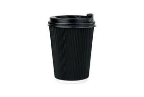 A disposable corrugated black paper cup with lid for coffee or tea isolated on white background. Close-up. photo