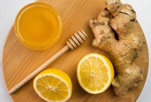 A honey, lemon and ginger for a vitamin and healthy drink. Top view. Close-up. Selective focus. photo