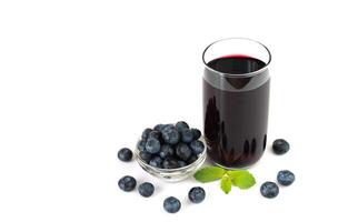 Fresh blueberry juice on a white background. Close-up. Copy space. photo