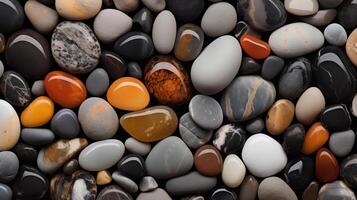 Multi-colored pebbles. Colored round pebbles lying tightly next to each other. Dark back photo