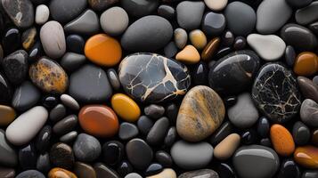 Multi-colored pebbles. Colored round pebbles lying tightly next to each other. Dark back photo