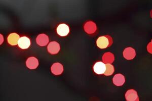 colorful and defocused lights on black background photo