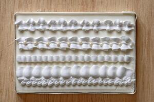 texture models and piping work for wedding cake decoration photo