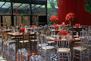 sophisticated wedding party in shades of red photo