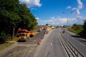 Roadway repairing aerial view. Transport construction industry. photo