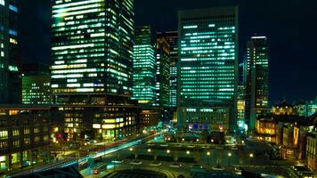 A timelapse of cityscape at the urban city in front of Tokyo station panning video