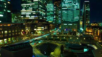 A timelapse of cityscape at the urban city in front of Tokyo station zoom video