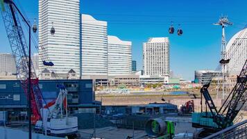 un lapso de tiempo de grua a el debajo construcción en Yokohama enfocar video