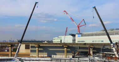 Cranes at the under construction in Tokyo video