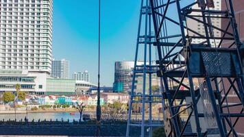 A timelapse of crane at the under construction in Yokohama telephoto shot zoom video