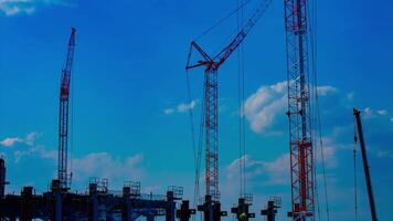 A timelapse of cranes at the under construction in Tokyo video