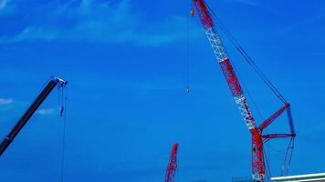 A timelapse of cranes at the under construction in Tokyo video