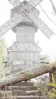 old traditional wooden windmill in the forest video