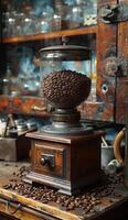 Old-fashioned coffee grinder and coffee beans on wooden table photo