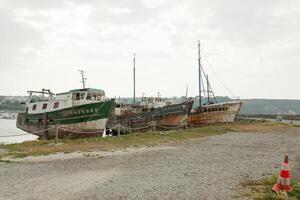 Wrecks of fishing boats at the ships cemetery, Camaret-sur-Mer, Finistere, Brittany, France 29 May 2018 photo