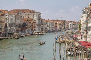 VENICE ITALY 2 JULY 2020 Canal grande landscape with boats and gondolas in Venice photo