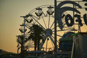 Panoramic wheel at sunset photo