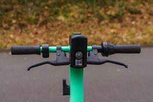 Front view of the steering wheel of an electric scooter. photo