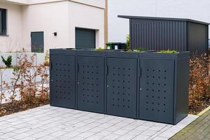 Stylish gray dumpster, recycle waste and garbage bins near residential building. photo