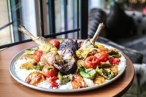 Delicious Platter of Food on a Rustic Wooden Table photo