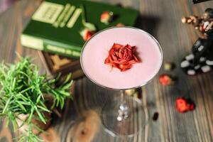 Pink Cocktail With Rose on Rim photo