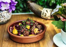 Bowl of Food on Wooden Table photo