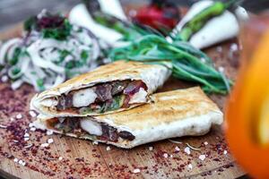 Close Up of Sandwich on Cutting Board photo