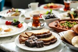 Abundant Spread Table Filled With Assorted Plates of Food photo