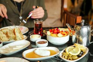 Table Set With Food and Tea Pot photo