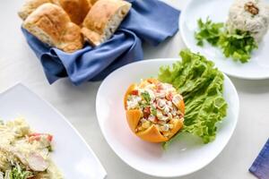 Table With White Plates Filled With Food photo