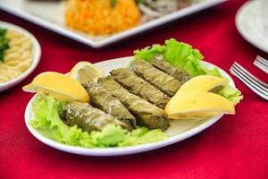 Plate of Food on Red Tablecloth photo