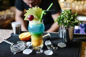 Relaxed Man Enjoying a Drink at a Bar photo