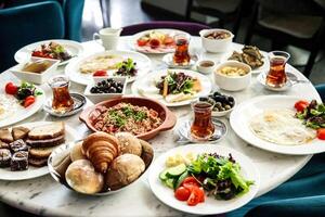 Table With Various Plates of Food photo