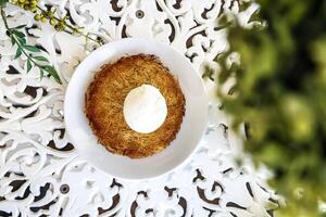 White Bowl Filled With Food on Table photo