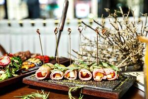 Wooden Table Adorned With Plates of Food photo