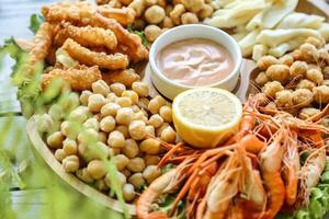 Platter of Shrimp With Assorted Foods photo