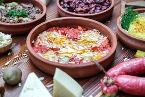 Table With a Variety of Food-filled Bowls photo