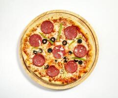 Pepperoni and Olive Pizza on Wooden Plate photo