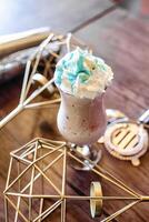 Cup of Ice Cream on Wooden Table photo