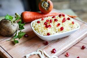 Wooden Cutting Board With Bowl of Food photo