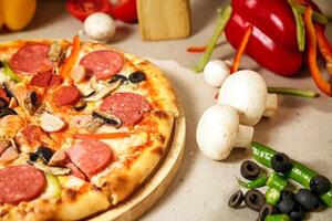 Pizza on Wooden Cutting Board photo