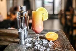 Refreshing Beverage With Shaker on Table photo