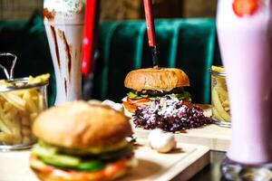 Burger and Fries on Table photo