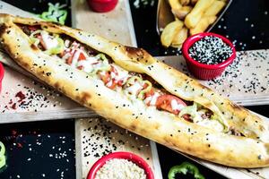 Long Bread Slice Resting on Cutting Board photo