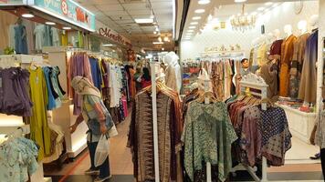 Jakarta, Indonesia - March 23, 2024, Atmosphere of a clothing store at the Thamrin City Shopping Center, Jakarta. photo