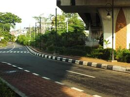 Surakarta, Central Java, Indonesia April 11, 2024. A sight seeing of Main Roads Slamet Riyadi Street in the morning. Not busy yet. People still preparing for their activity photo