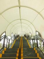 Pedestrian bridge with tunnel style design. pedestrian tunnel circle. Modern contemporary style for urban people. photo