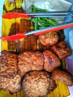 tempeh tofu authentic Indonesian food. Sweet tempeh and tofu or bacem is a traditional cuisine from Central Java and Yogyakarta made from tempeh or tofu made from soybeans is cooked with palm sugar photo