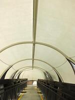 Pedestrian bridge with tunnel style design. pedestrian tunnel circle. Modern contemporary style for urban people. photo