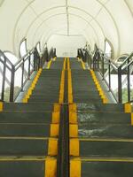 Pedestrian bridge with tunnel style design. pedestrian tunnel circle. Modern contemporary style for urban people. photo